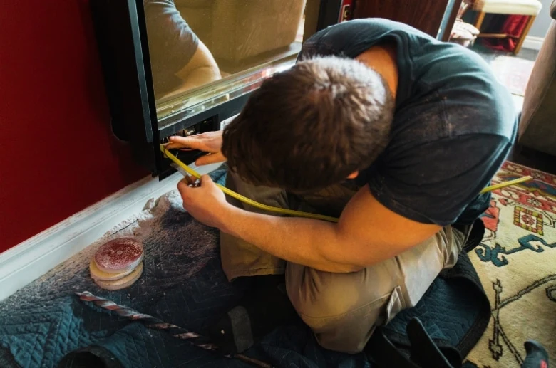 professional repairing electric fireplace